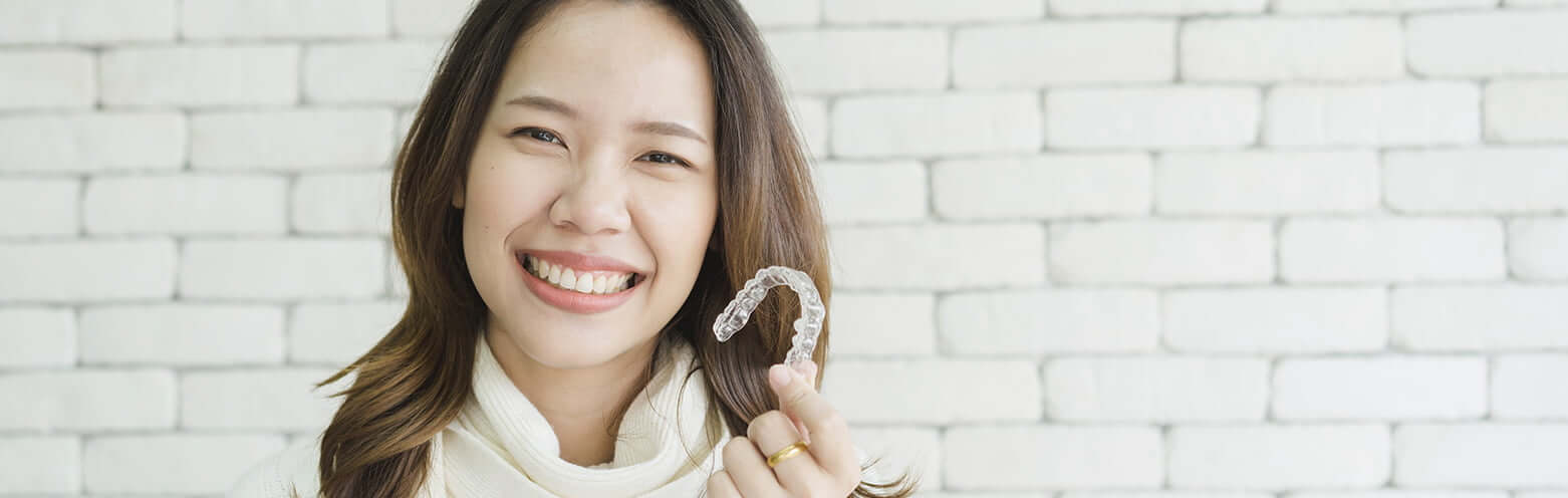 woman with clearcorrect clear aligner