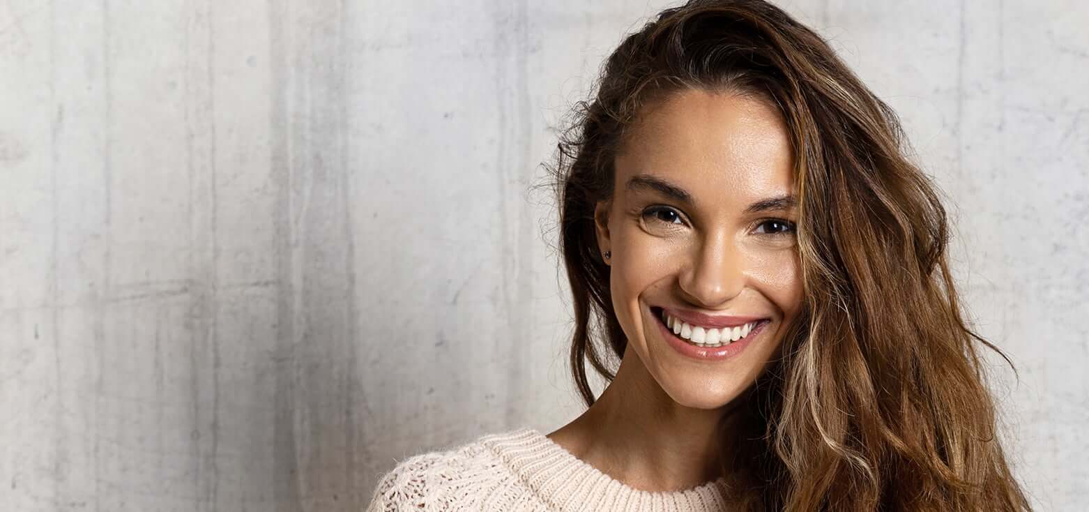 brunette woman smiling