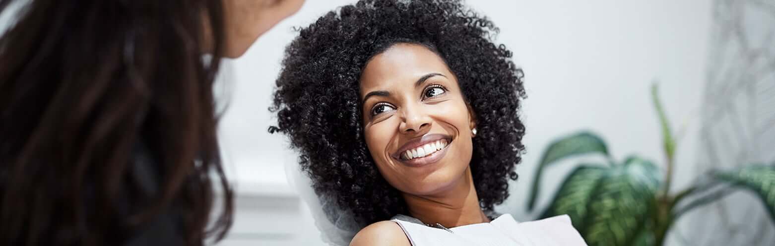 woman smiling in dental chair