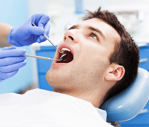 man at the dentist