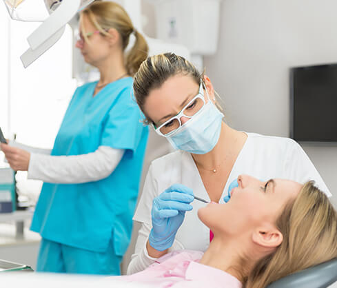 woman getting a dental exam