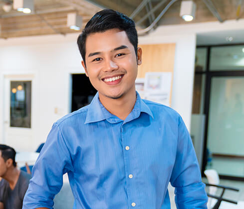 young man with a bright, white smile